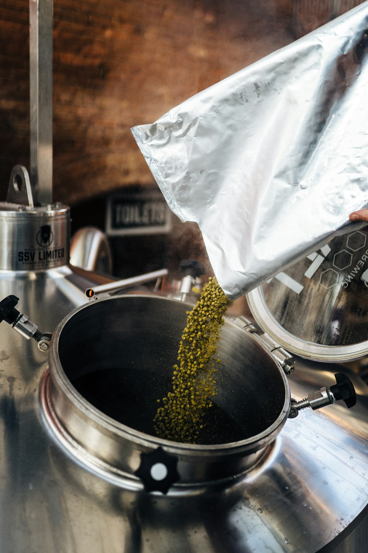 Home brewing equipment on wooden table