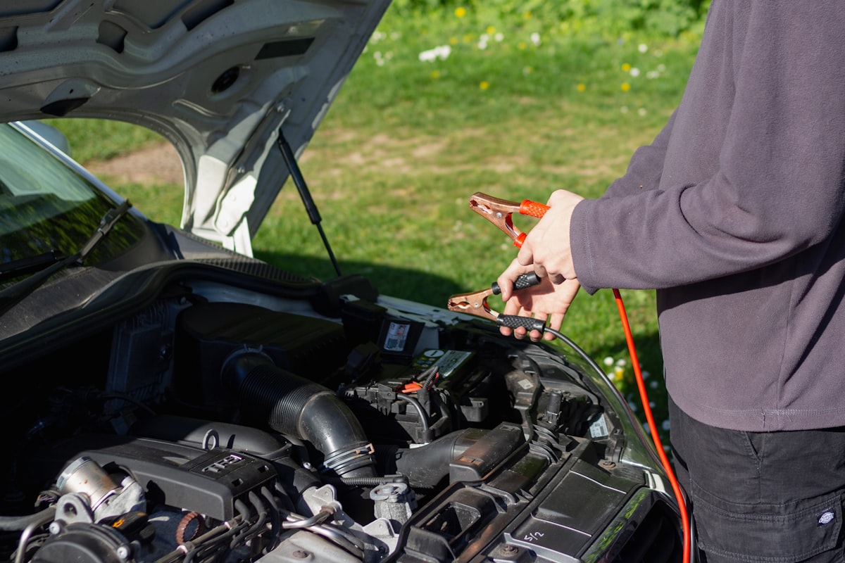 Portable car jump starters and battery booster packs