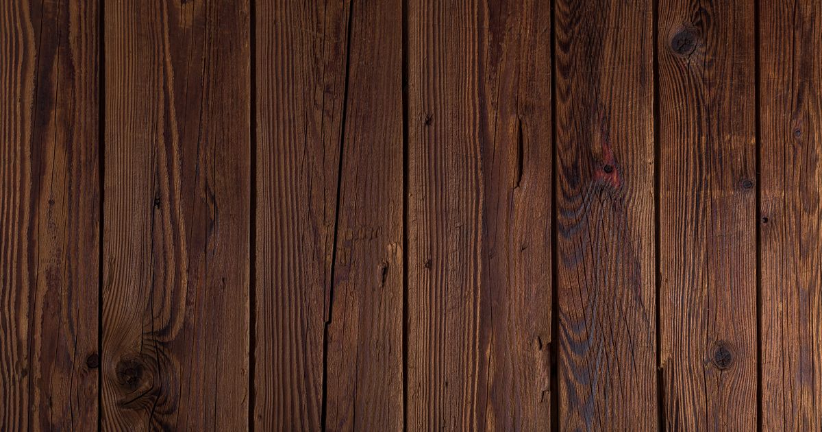 Weathered wooden decking boards ready for cleaning