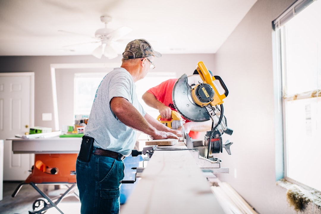 Budget DIY tools for home repairs laid out on a wooden workbench