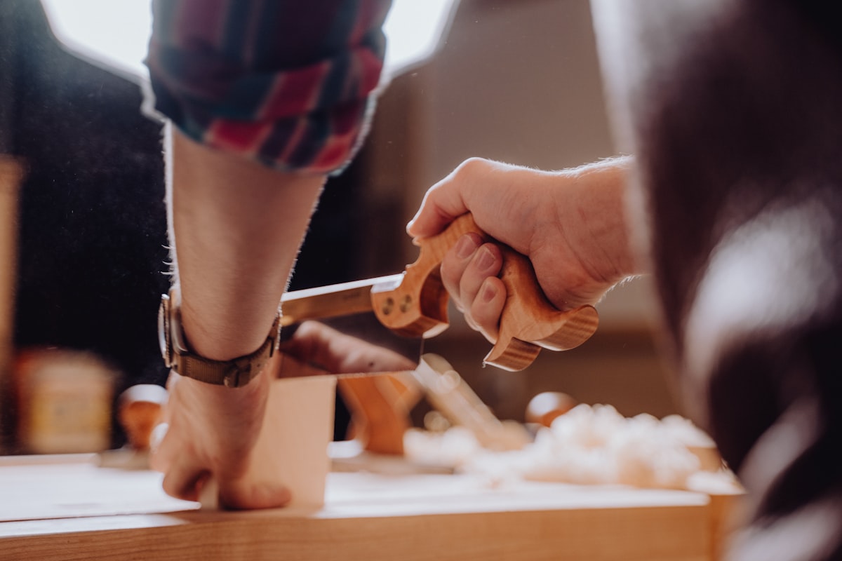 Woodworking workshop with chisels and hand tools on a workbench